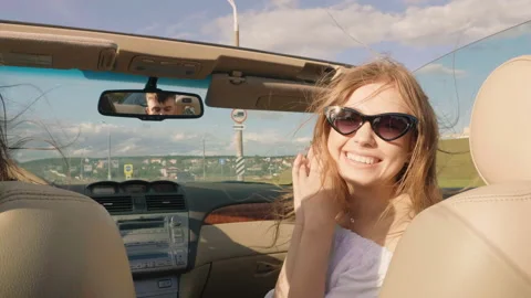 Positive model riding and having fun at sunglasses Stock Footage 146108516