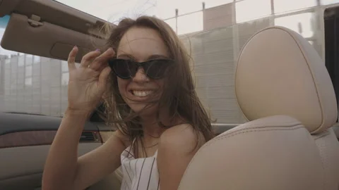 Positive model riding and having fun at sunglasses Stock Footage 146108817