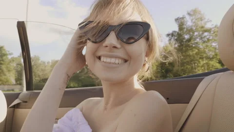 Positive model riding and having fun at sunglasses Stock Footage 146108937