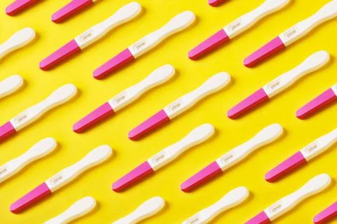Positive pregnancy tests pattern Stock Photos