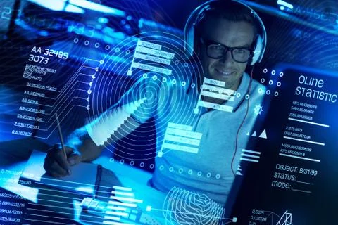 Positive programmer coding at night Stock Photos