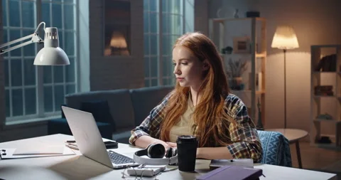 Positive redhead caucasian high school or university student listening to music Stock Footage 130604752