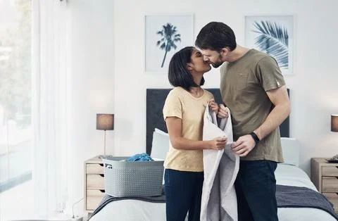 Positive reinforcement makes all the difference. an affectionate young couple Stock Photos