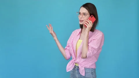 Positive smart lady call device say tell jokes isolated blue color background Stock Footage 166507550