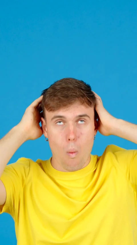 Positive student pointing up to copy space Stock Footage 254458253