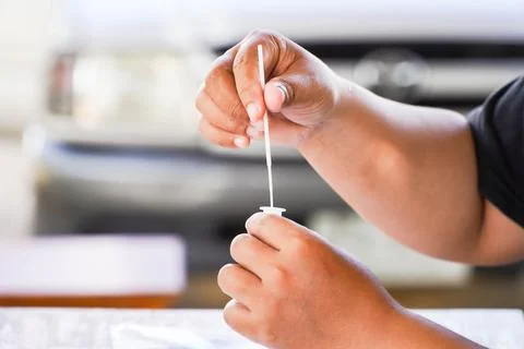 Positive test result by using rapid test for COVID-19, quick fast antibody po Stock Photos