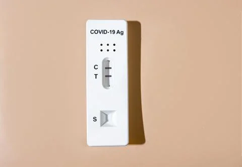 Positive test result by using rapid test device for COVID-19 Photos