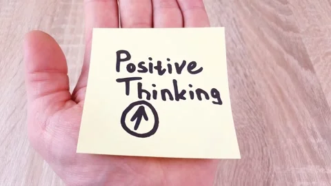 Positive Thinking text, inscription note on paper in hand, feedback Stock Footage 294588235