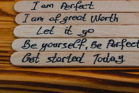 Positive thoughts to increase self esteem on wooden sticks Stock Photos