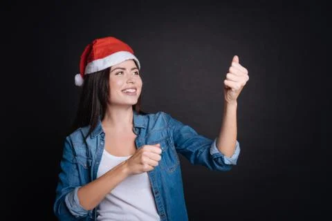 Positive woman using flapper Stock Photos