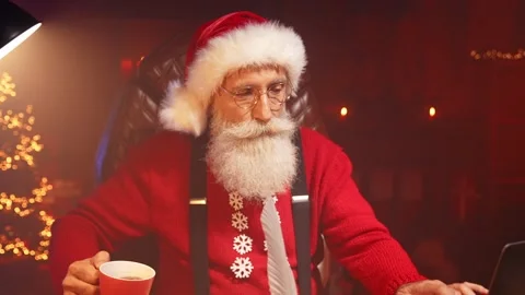 Positive worker santa claus write letter ink feather drink coffee typing laptop Stock Footage 159840004