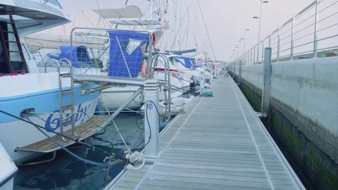 POSITO BLANCO, SPAIN - CIRCA NOVEMBER 2017: Ponton of marine with plenty of Stock Footage 83223448