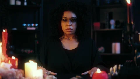 Possessed witch with creepy eyes practicing magic, communicating with ghosts Stock Footage 168313196