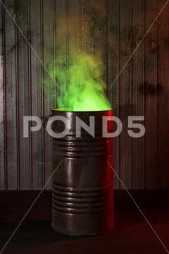Post-apocalyptic background with old rusty barrel Stock Photos