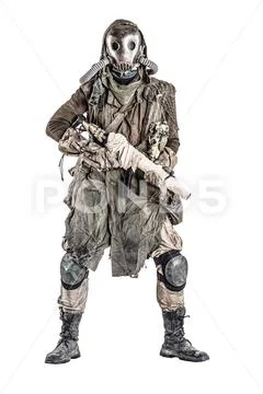 Post apocalyptic creature in gas mask armed by gun Stock Photos