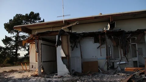 Post apocalyptic shot of half torn down building Stock Footage 94694770