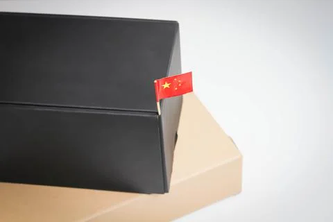 Post from China. Receiving a parcel. Box with the Chinese flag. Stockfoto's