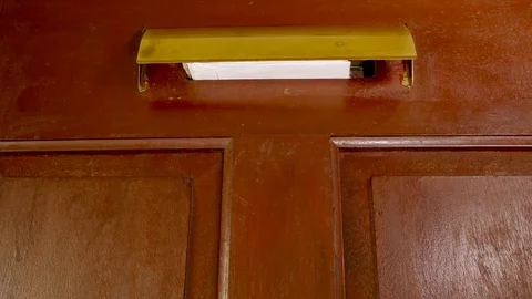 Post coming through a letterbox. Stock-Footage 71171053