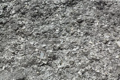 Post-glacial crushed bits of stones in form of flakes Stock Photos