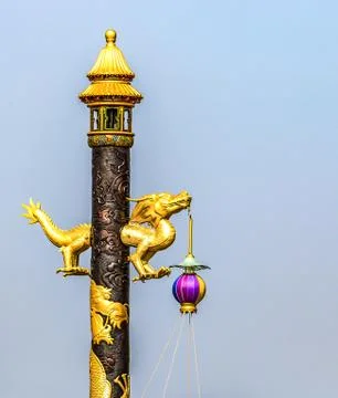 Post with golden Statue of dragon inside the Forbidden City in Beijing in the Stock Photos