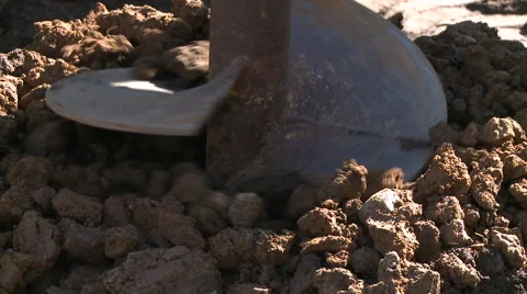 Post hole borer digging Stock Footage 57714468