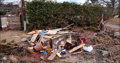 Post Hurricane Michael drive by debris, refrigerators, surge flotsam, house Stock Footage 98827320