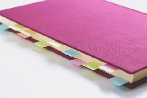 Post-it notes on a notebook 스톡 사진