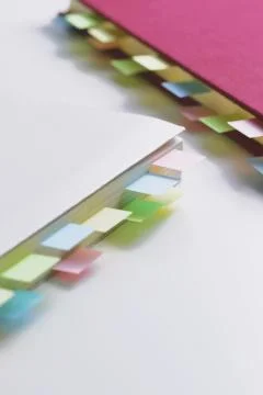 Post-it notes on a notebook Stock Photos