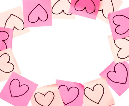Post-it pink frame with drawn hearts closeup Stock Photos