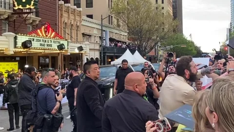 Post Malone signs autographs during SXSW 2024 for Road House Movie Video stock 267630577