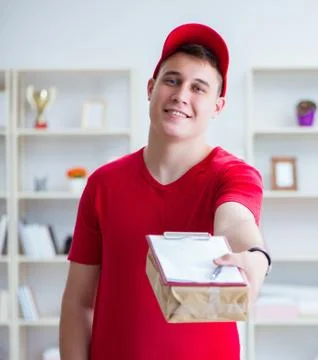 Post man delivering a parcel package Stock Photos