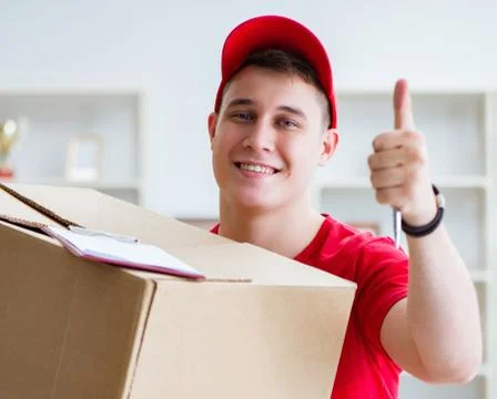 Post man delivering a parcel package Foto stock