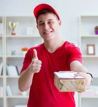 Post man delivering a parcel package Stockfoto's