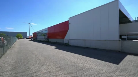 Post nl sorting center, whit a Postnl truck is driving by. Stock Footage 134021463