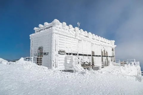 Post office called Postovna on top of Snezka covered with frost. The peak of the Stock Photos