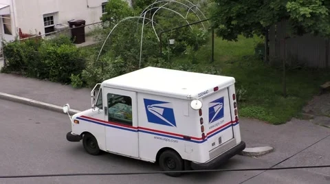 Post office mail truck, street delivery Stock Footage