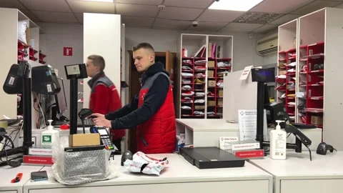 Post office a place to send parcels a lot of different parcels in the background Stock Footage 230040440