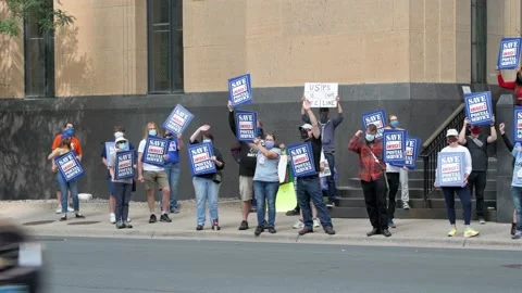 Post office workers rally to demand that congress act to save the postal service Video stock 139599742