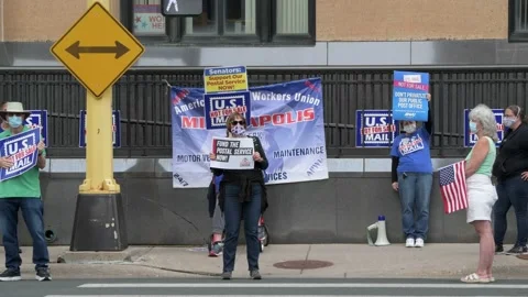 Post office workers rally to demand that congress act to save the postal service Video stock 139600056
