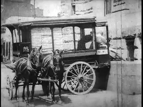 Post office workers unload internal revenue stamps from a horse-drawn mail Stock Footage 83217618