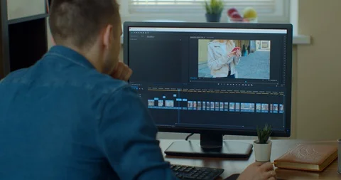 Post production and vlog concept - man working in video editor program on laptop Stock Footage 129452629