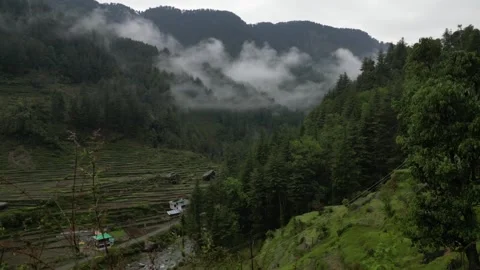 Post-Rain Clouds Embrace Green Himalayan Mountains – Drone Shot Video stock 313382564