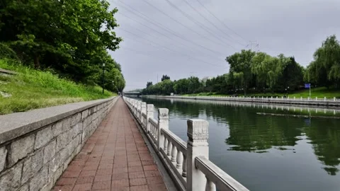 Post-Rain Evening Walk by the River in Summer Stock Footage 316517585