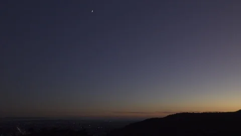 Post sunset LA basin Moon above Stock Footage 122351005