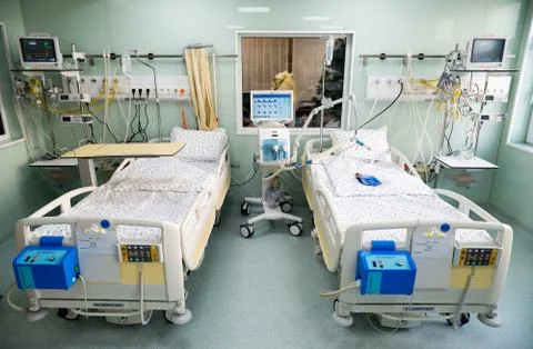 Post surgery clinic for patients, with medical beds, respiratory support syst Stock Photos