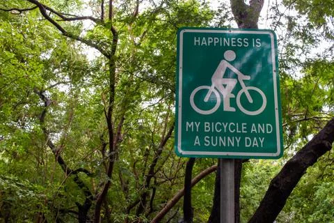 Post for using bicycle which is environmentally friendly mode of transport Stock Photos