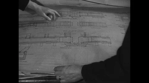 Post War Civil Engineering, engineers showing technical drawings, UK 1950s Stock Footage 143963783