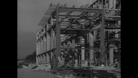 Post War Civil Engineering, errection of steel frame at construction, UK 1950s Stock Footage 143965787