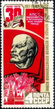 Postage stamp with the image of Lenin, Flag and Kremlin. From the series on.. Stock Photos