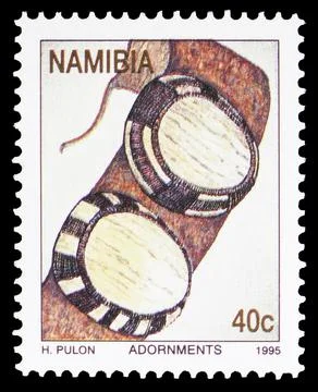 Postage stamp printed in Namibia shows Ivory buttons, Traditional adornments  Stock Photos
